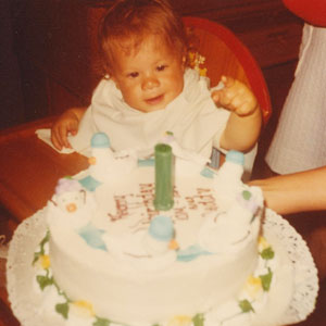 baby with birthday cake