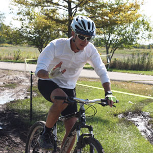 Tom riding a bicycle