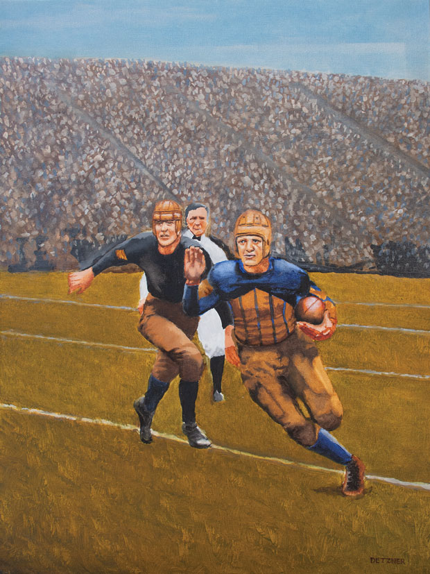 Red Grange running with football with another player in pursuit