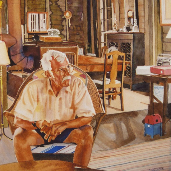 elderly man sitting in a summer cottage