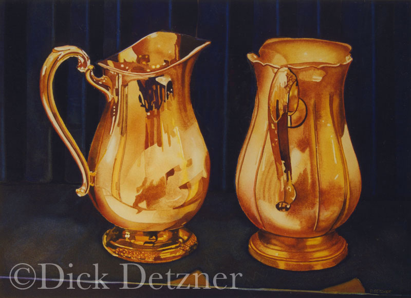 3 ornate silver pitchers