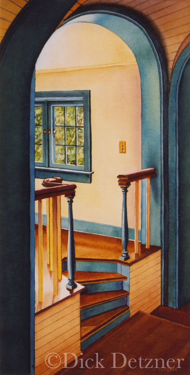 small stairs under a barrell-vaulted hallway