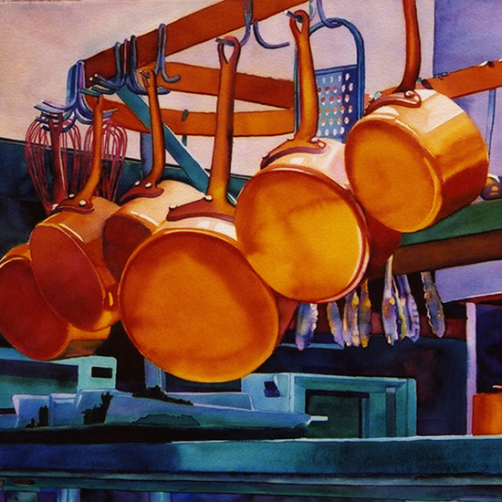 row of pots and pans hanging from a rack