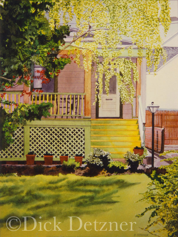 front porch of a house with trees in bloom