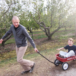 Tom pulling Nathaniel in a wagon